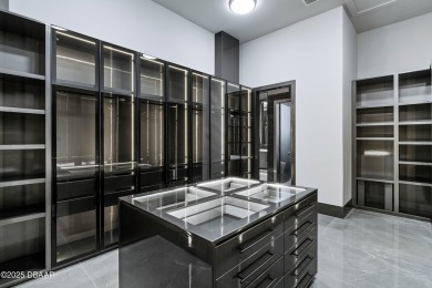 Step into a Masterpiece of Modern Sophistication

Privately on Plantation Bay Golf and Country Club in Florida - for sale on GolfHomes.com, golf home, golf lot
