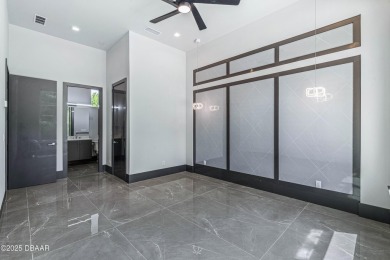 Step into a Masterpiece of Modern Sophistication

Privately on Plantation Bay Golf and Country Club in Florida - for sale on GolfHomes.com, golf home, golf lot