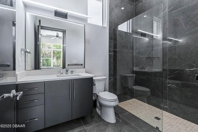 Step into a Masterpiece of Modern Sophistication

Privately on Plantation Bay Golf and Country Club in Florida - for sale on GolfHomes.com, golf home, golf lot