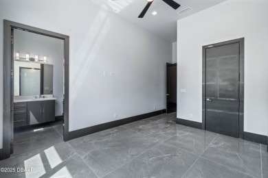 Step into a Masterpiece of Modern Sophistication

Privately on Plantation Bay Golf and Country Club in Florida - for sale on GolfHomes.com, golf home, golf lot