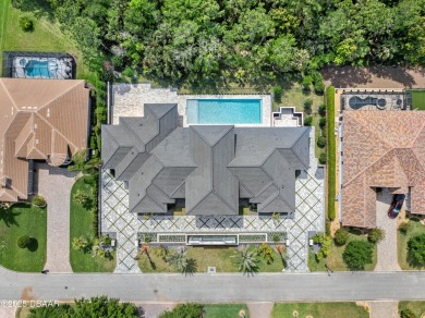 Step into a Masterpiece of Modern Sophistication

Privately on Plantation Bay Golf and Country Club in Florida - for sale on GolfHomes.com, golf home, golf lot