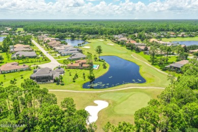 Step into a Masterpiece of Modern Sophistication. This on Plantation Bay Golf and Country Club in Florida - for sale on GolfHomes.com, golf home, golf lot