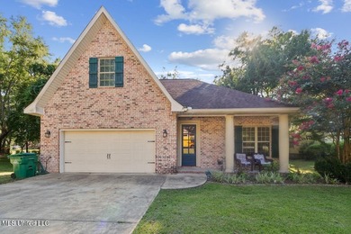 Charming 4-bedroom, 2-bath, two-story home offering over 2,000 on Diamondhead Country Club in Mississippi - for sale on GolfHomes.com, golf home, golf lot