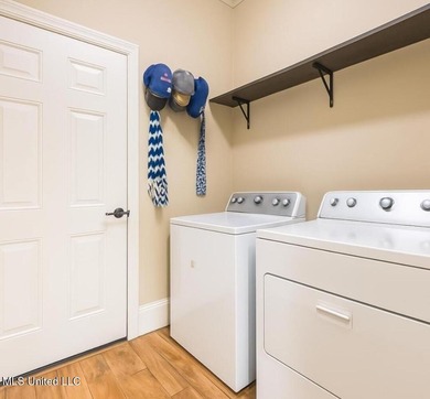 Charming 4-bedroom, 2-bath, two-story home offering over 2,000 on Diamondhead Country Club in Mississippi - for sale on GolfHomes.com, golf home, golf lot