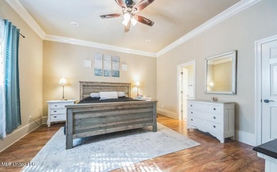 Charming 4-bedroom, 2-bath, two-story home offering over 2,000 on Diamondhead Country Club in Mississippi - for sale on GolfHomes.com, golf home, golf lot