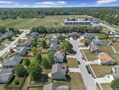 Discover this charming two-story home in the desirable Mill on Arlington Park Association in Indiana - for sale on GolfHomes.com, golf home, golf lot