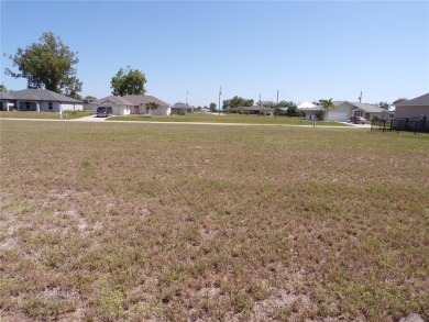 This lot has CITY Water and Sewer with a great greenbelt behind on Burnt Store Golf Club in Florida - for sale on GolfHomes.com, golf home, golf lot