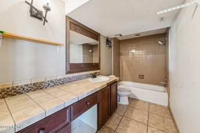This is a rare opportunity to restore or redevelop a rode-hard on Park Meadows Country Club in Utah - for sale on GolfHomes.com, golf home, golf lot