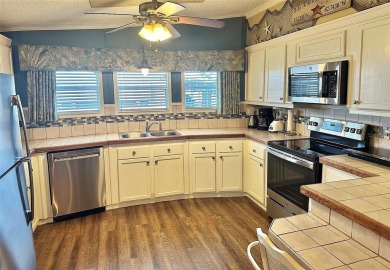 New Lower Price! Gorgeous Decorator 2006, 28x52/55, 1540 sq. ft on Mainlands Golf Club in Florida - for sale on GolfHomes.com, golf home, golf lot