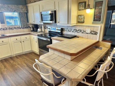 New Lower Price! Gorgeous Decorator 2006, 28x52/55, 1540 sq. ft on Mainlands Golf Club in Florida - for sale on GolfHomes.com, golf home, golf lot