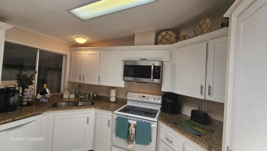 Discover this beautifully maintained home in Florida's premier on The Riverside Golf Club in Florida - for sale on GolfHomes.com, golf home, golf lot