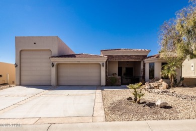 Take a look at this stunning RV garage home located in a private on London Bridge Golf Course in Arizona - for sale on GolfHomes.com, golf home, golf lot