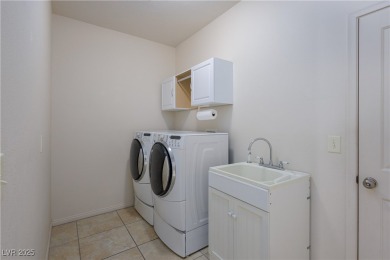 This 4-bed, 2 bath townhome sits right on the golf course with on Coyote Willows Golf Club in Nevada - for sale on GolfHomes.com, golf home, golf lot