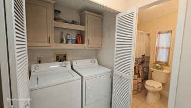 Discover this beautifully maintained home in Florida's premier on The Riverside Golf Club in Florida - for sale on GolfHomes.com, golf home, golf lot