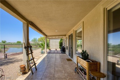 This 4-bed, 2 bath townhome sits right on the golf course with on Coyote Willows Golf Club in Nevada - for sale on GolfHomes.com, golf home, golf lot