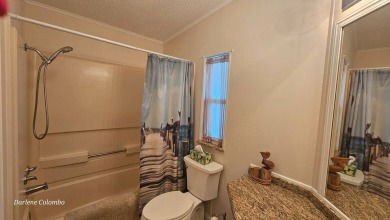 Discover this beautifully maintained home in Florida's premier on The Riverside Golf Club in Florida - for sale on GolfHomes.com, golf home, golf lot