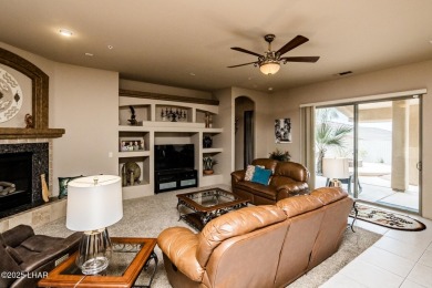 Take a look at this stunning RV garage home located in a private on London Bridge Golf Course in Arizona - for sale on GolfHomes.com, golf home, golf lot