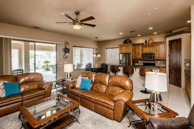 Take a look at this stunning RV garage home located in a private on London Bridge Golf Course in Arizona - for sale on GolfHomes.com, golf home, golf lot