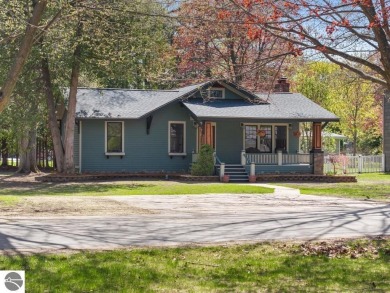 This brilliantly restored home delivers comfort, charm, and on Charlevoix Golf Club in Michigan - for sale on GolfHomes.com, golf home, golf lot