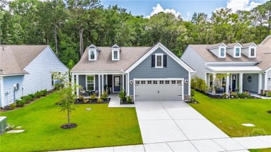 Welcome to your forever home nestled in a secure gated community on Savannah Quarters Country Club in Georgia - for sale on GolfHomes.com, golf home, golf lot