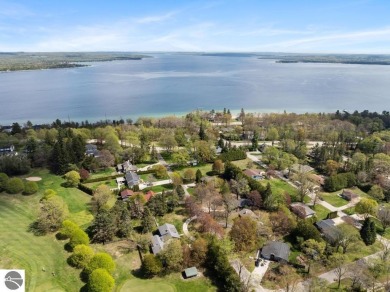 This brilliantly restored home delivers comfort, charm, and on Charlevoix Golf Club in Michigan - for sale on GolfHomes.com, golf home, golf lot