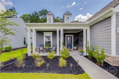 Welcome to your forever home nestled in a secure gated community on Savannah Quarters Country Club in Georgia - for sale on GolfHomes.com, golf home, golf lot