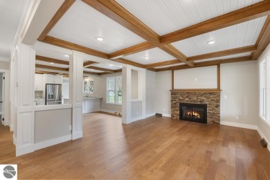 This brilliantly restored home delivers comfort, charm, and on Charlevoix Golf Club in Michigan - for sale on GolfHomes.com, golf home, golf lot