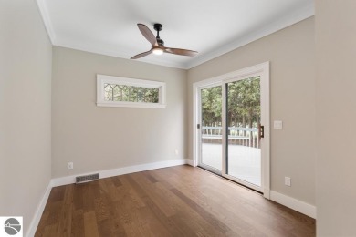 This brilliantly restored home delivers comfort, charm, and on Charlevoix Golf Club in Michigan - for sale on GolfHomes.com, golf home, golf lot