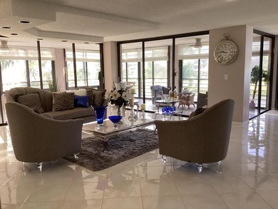 Custom-decorated 2nd-floor unit with neutral colors and two new on  in Florida - for sale on GolfHomes.com, golf home, golf lot