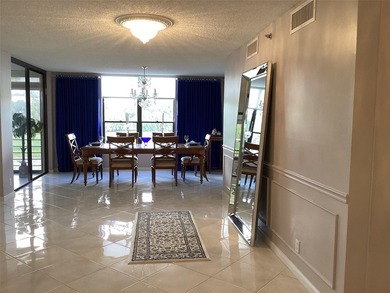 Custom-decorated 2nd-floor unit with neutral colors and two new on  in Florida - for sale on GolfHomes.com, golf home, golf lot