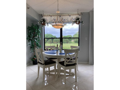 Custom-decorated 2nd-floor unit with neutral colors and two new on  in Florida - for sale on GolfHomes.com, golf home, golf lot