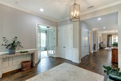 Welcome to this spacious move-in ready home that shows like a on Savannah Quarters Country Club in Georgia - for sale on GolfHomes.com, golf home, golf lot