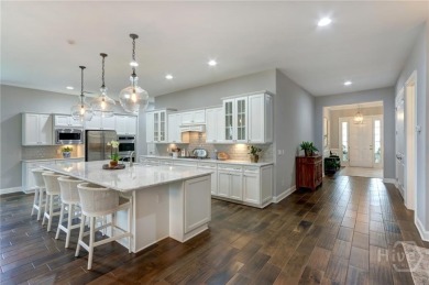 Welcome to this spacious move-in ready home that shows like a on Savannah Quarters Country Club in Georgia - for sale on GolfHomes.com, golf home, golf lot