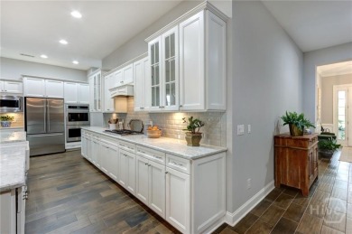 Welcome to this spacious move-in ready home that shows like a on Savannah Quarters Country Club in Georgia - for sale on GolfHomes.com, golf home, golf lot