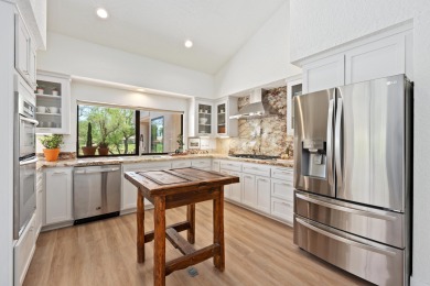 Tucked away on a quiet cul-de-sac overlooking the18th tee box of on PGA West Private Golf Courses in California - for sale on GolfHomes.com, golf home, golf lot