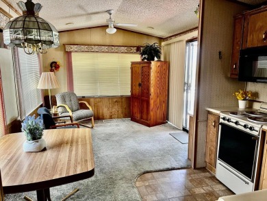 This darling Park Model Home is very clean, has a washer/dryer on Green Spring Country Club in Utah - for sale on GolfHomes.com, golf home, golf lot