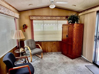 This darling Park Model Home is very clean, has a washer/dryer on Green Spring Country Club in Utah - for sale on GolfHomes.com, golf home, golf lot