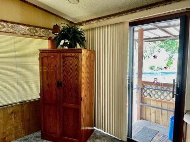 This darling Park Model Home is very clean, has a washer/dryer on Green Spring Country Club in Utah - for sale on GolfHomes.com, golf home, golf lot