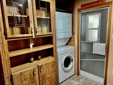 This darling Park Model Home is very clean, has a washer/dryer on Green Spring Country Club in Utah - for sale on GolfHomes.com, golf home, golf lot