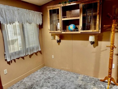 This darling Park Model Home is very clean, has a washer/dryer on Green Spring Country Club in Utah - for sale on GolfHomes.com, golf home, golf lot