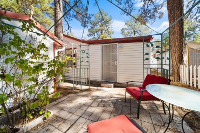 See this charming, site-built home with a Sunroom that you can on Bison Golf and Country Club in Arizona - for sale on GolfHomes.com, golf home, golf lot