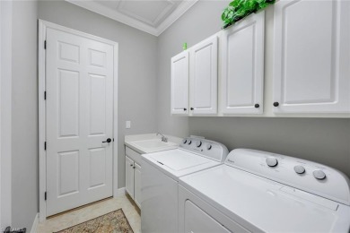 Full golf membership included! This immaculate Doral model is on Heritage Bay Golf Course in Florida - for sale on GolfHomes.com, golf home, golf lot