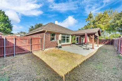 Welcome to this immaculate 4-bedroom with a study, 2.5-bathroom on Mansfield National Golf Club in Texas - for sale on GolfHomes.com, golf home, golf lot