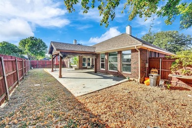 Welcome to this immaculate 4-bedroom with a study, 2.5-bathroom on Mansfield National Golf Club in Texas - for sale on GolfHomes.com, golf home, golf lot
