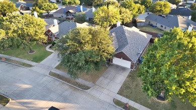 Welcome to this immaculate 4-bedroom with a study, 2.5-bathroom on Mansfield National Golf Club in Texas - for sale on GolfHomes.com, golf home, golf lot