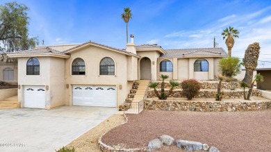 This beautifully updated 5-bedroom, 4-bathroom home in Lake on London Bridge Golf Course in Arizona - for sale on GolfHomes.com, golf home, golf lot