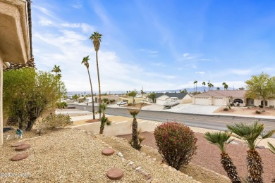 This beautifully updated 5-bedroom, 4-bathroom home in Lake on London Bridge Golf Course in Arizona - for sale on GolfHomes.com, golf home, golf lot