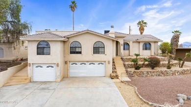 This beautifully updated 5-bedroom, 4-bathroom home in Lake on London Bridge Golf Course in Arizona - for sale on GolfHomes.com, golf home, golf lot