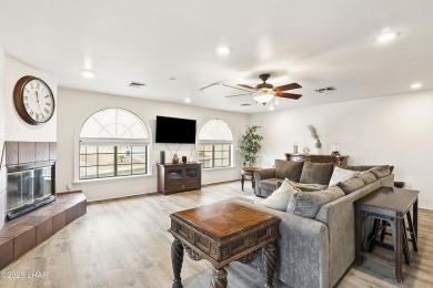 This beautifully updated 5-bedroom, 4-bathroom home in Lake on London Bridge Golf Course in Arizona - for sale on GolfHomes.com, golf home, golf lot