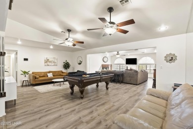 This beautifully updated 5-bedroom, 4-bathroom home in Lake on London Bridge Golf Course in Arizona - for sale on GolfHomes.com, golf home, golf lot